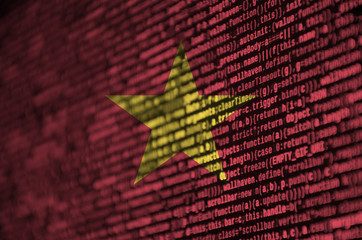 Vietnam flag  is depicted on the screen with the program code. The concept of modern technology and site development