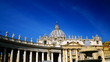 Rome, Italy - September 10, 2018: Piazza San Pietro with the Bernini colonnade on the sides, with Latin inscriptions on the facade