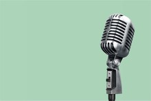 Retro Style Microphone On Background