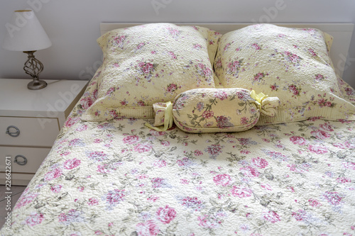 Vintage Old Fashioned Bedroom With Bed Comforter Quilt