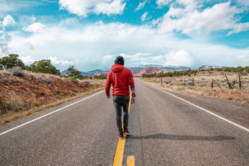 Man walking on road in Utah