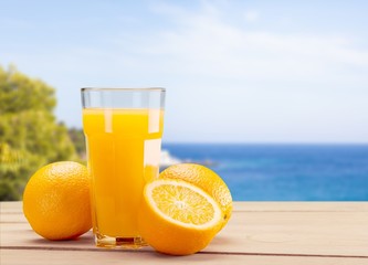 Canvas Print - Glass of delicious orange juice on natural