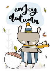  Cute little bear found a big acorn in a clearing. Fall, autumn illustration. Vector