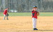 © J. Novack - Young Baseball Player Giving a Thumbs Up