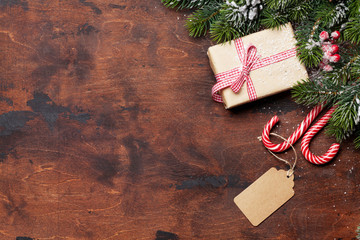 Christmas gift box and fir tree branch