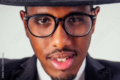 Fotomural portrait african businessman american man in stylish suit wear glasses studio sh