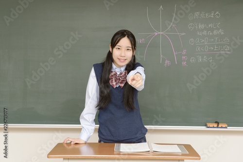 黒板に数式を書く女子高校生 Stock Photo Adobe Stock 黒板に数式を書く女子高校生 Stock Photo Adobe Stock