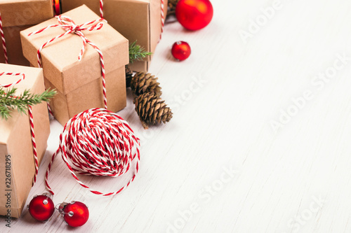 Christmas gift boxes collection with evergreen branches, candy cane Christmas...