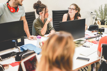 Young co-workers team talking during startup