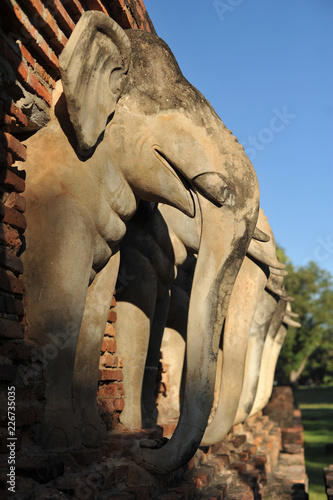 Fotografie, Obraz Wat Chang lom, elephant statues around Sukhothai Historical Park,Sukhothai Thail