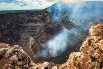 masaya volcano national park in nicaragua, wide shot of the active volcano with boiling lava in the 