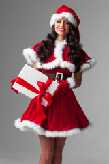 Canvas Print - Woman in red Santa Claus outfit