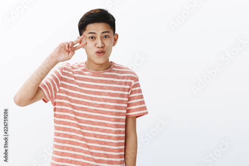 Happy Charismatic Cute Asian Guy With Short Hairstyle