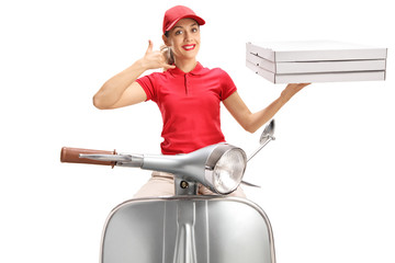 Canvas Print - Pizza delivery girl on a vintage scooter making a call me gesture