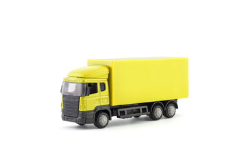 Poster - Yellow truck miniature on white background 