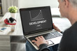 © thodonal - Business development concept on a laptop screen