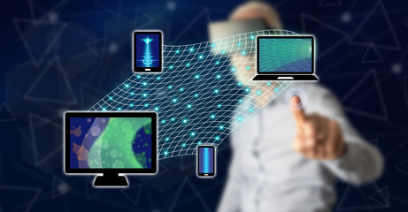 Wall Mural - man touching a device connection concept