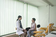 © LStockStudio - A Woman Physician Talking With Her Patient