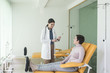 © LStockStudio - A Woman Physician Talking With Her Patient