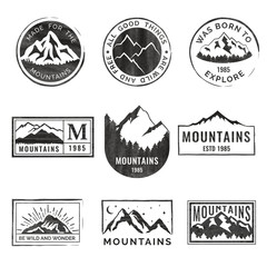 Wall Mural - Set of nine mountain travel emblems with grunge texture. Camping outdoor adventure emblems, badges and logo patches. Mountain tourism, hiking. Forest camp labels in vintage style