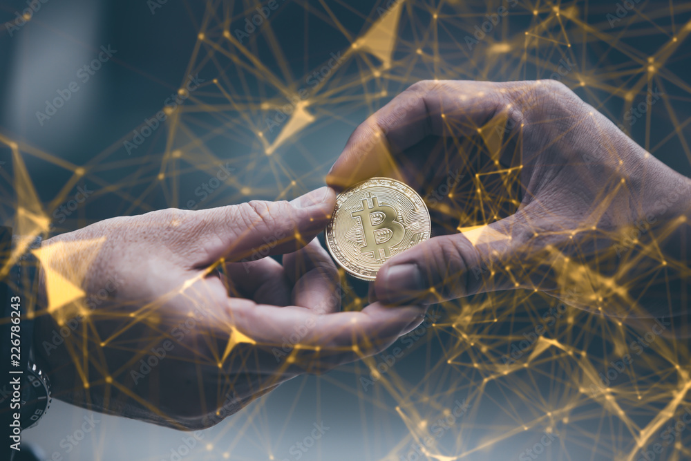 Businessman gives the bitcoin man.selective focus.block chain Technology concept.War of bitcoin,Digital currency.