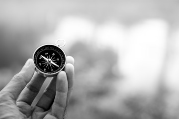 compass in the hand. - dark concept