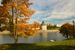 Beautiful autumn day in the park of the city of Pskov with a view of the tower..
