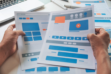 Website designer Creative planning application developer development draft sketch drawing template layout prototype framework wireframe design studio . User experience concept .