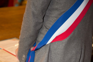 Wall Mural - French mayor with a scarf flag during weeding day at city hall