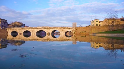 Sticker - view of roman bridge reflecting in water in Rimini, Italy