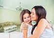 © BillionPhotos.com - Happy Mother and daughter hugging
