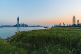 Fototapeta Big Ben - Wuhan riverbank scenery with both Yangtze riverside skyline at sunset in Wuhan China
