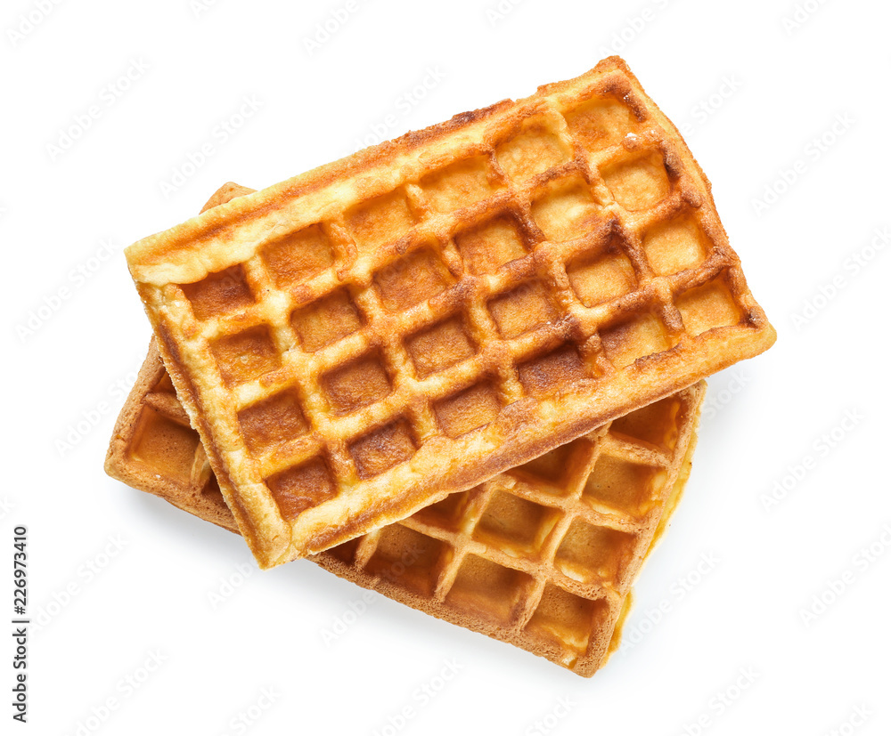 Delicious waffles on white background
