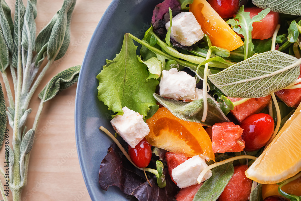 Delicious watermelon salad on plate, closeup