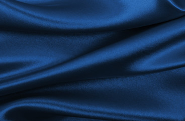 smooth elegant blue silk or satin luxury cloth texture as abstract background. luxurious background 