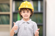 © Nattanon - Cute kids wearing yellow engineer helmet. Development of Human Resources in Education Concept. Setup studio shooting.
