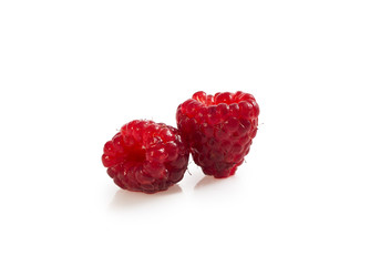 Wall Mural - Heap of ripe raspberry isolated on white.