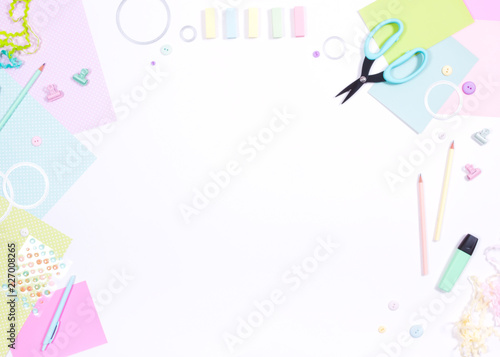 Fotomural DIY Сraft supplies on a white background - scrapbook paper scissors button marker pencil cutting dies, workplace top view, flat