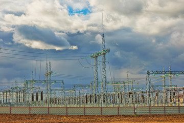 Power distribution station on agricultural land.