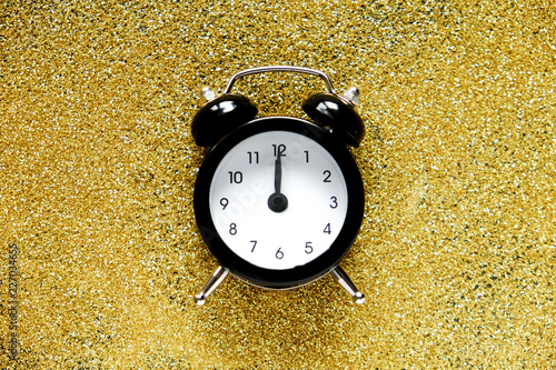 Holiday Coundown Concept Old Alarm Clock That Shows 12 Am Time Laying On Beautiful Shiny Glossy Golden Glitter Background Copy Space Close Up Top View Flat Lay Stock Photo Adobe Stock