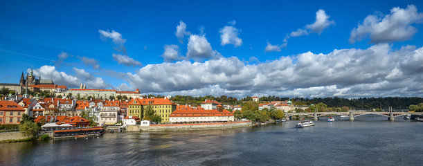  Bright and beautiful autumn view on Vltava river, Saint Vitus Cathedral and Prague Castle, Prague, Czech Republic