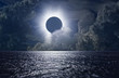 Total solar eclipse above the clouds and sea