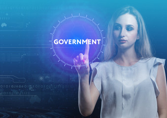 The concept of business, technology, the Internet and the network. A young entrepreneur working on a virtual screen of the future and sees the inscription: Government