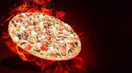 Wall Mural - hot fresh traditional italian pizza in flames