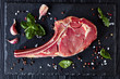 © myviewpoint - Dry aged raw tomahawk or cowboy beef steak