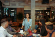 © Mhandy/Creative Flame - Business people talking in office meeting