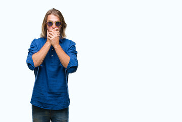 Sticker - Young handsome man with long hair wearing sunglasses over isolated background shocked covering mouth with hands for mistake. Secret concept.