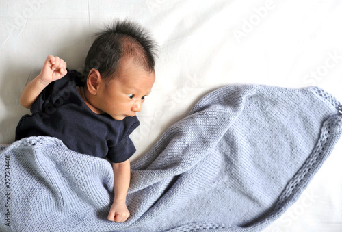 Adorable Baby Boy In White Sunny Bedroom Newborn Child Relaxing