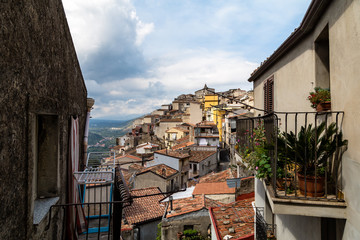 View of Motta Camastra from Corso Umberto. Motta Camastra is  a village in Sicily not far from Taormina, perched on the top of a hill in the valley of the Alcantara River