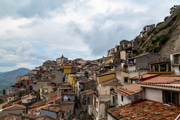 View of Motta Camastra from Corso Umberto. Motta Camastra is  a village in Sicily not far from Taormina, perched on the top of a hill in the valley of the Alcantara River